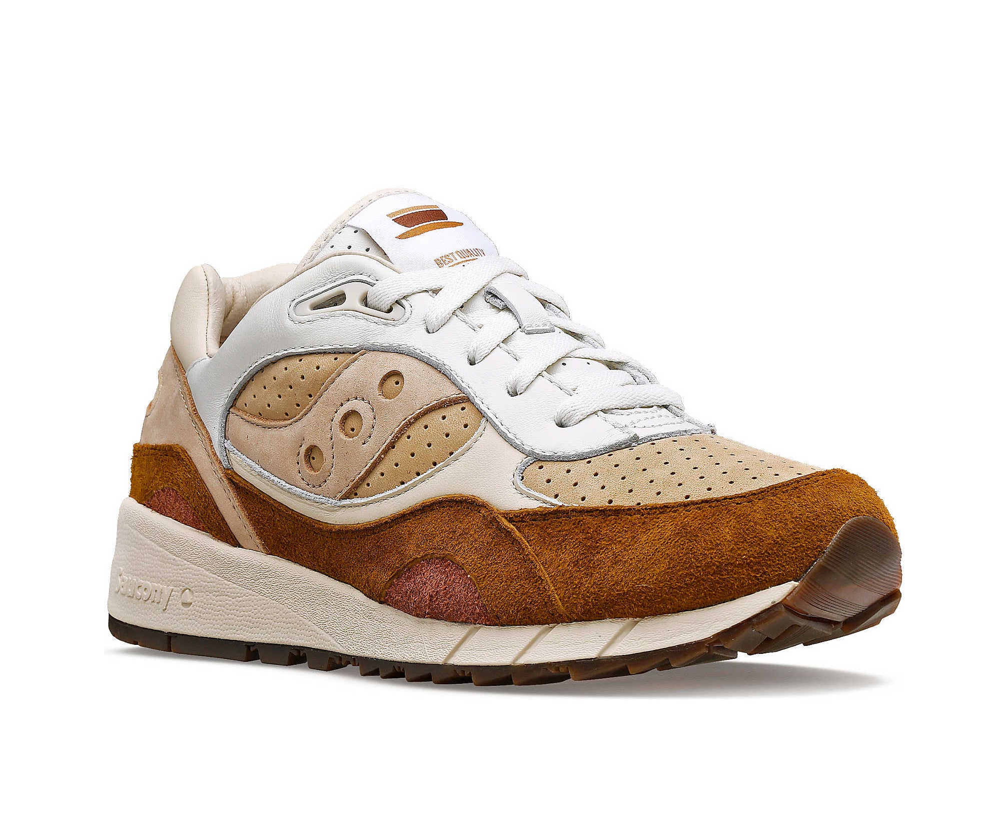 A suede low-cut Saucony sneaker in various shades of light brown.