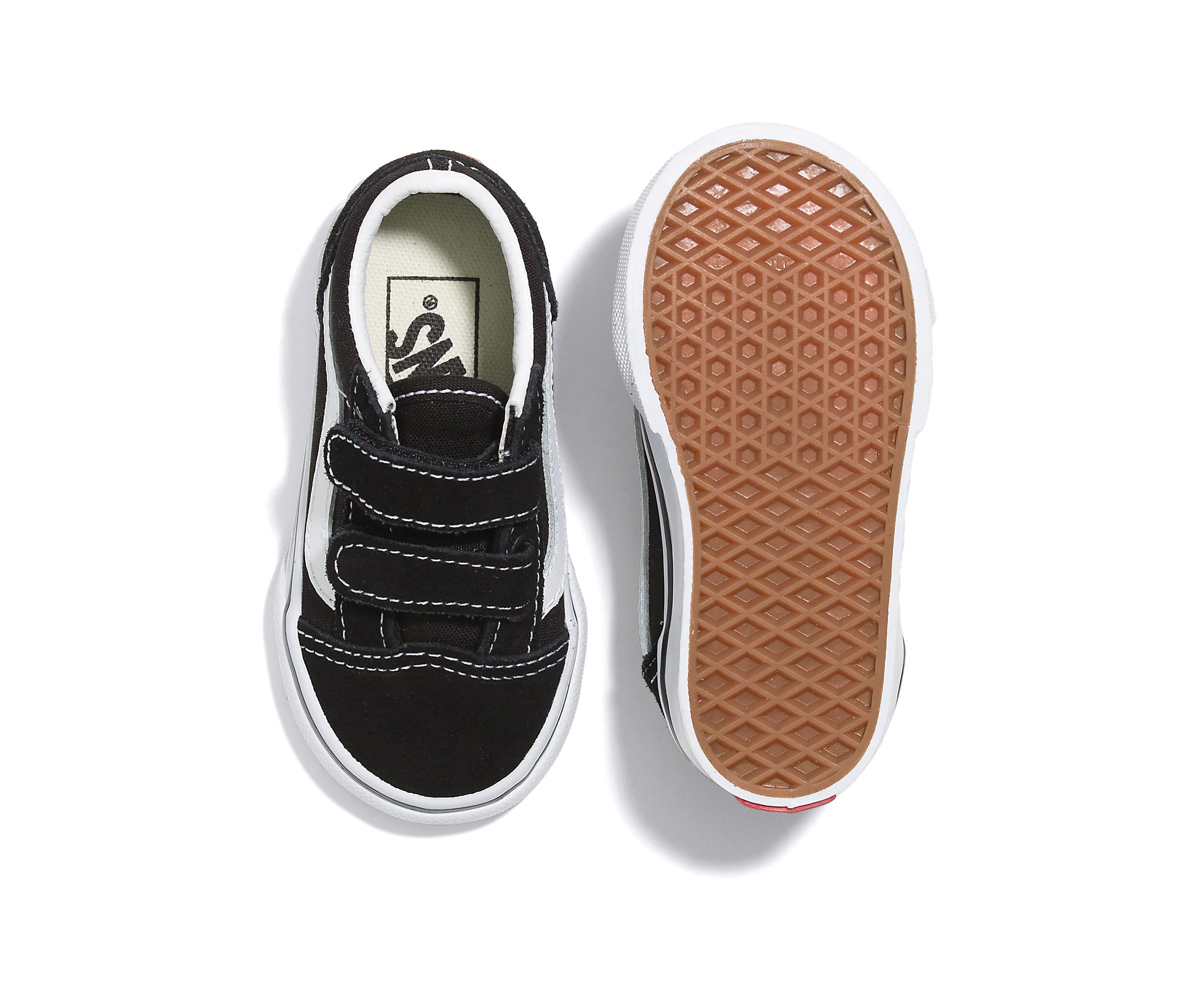 A black canvas and suede kids' sneaker with velcro straps.