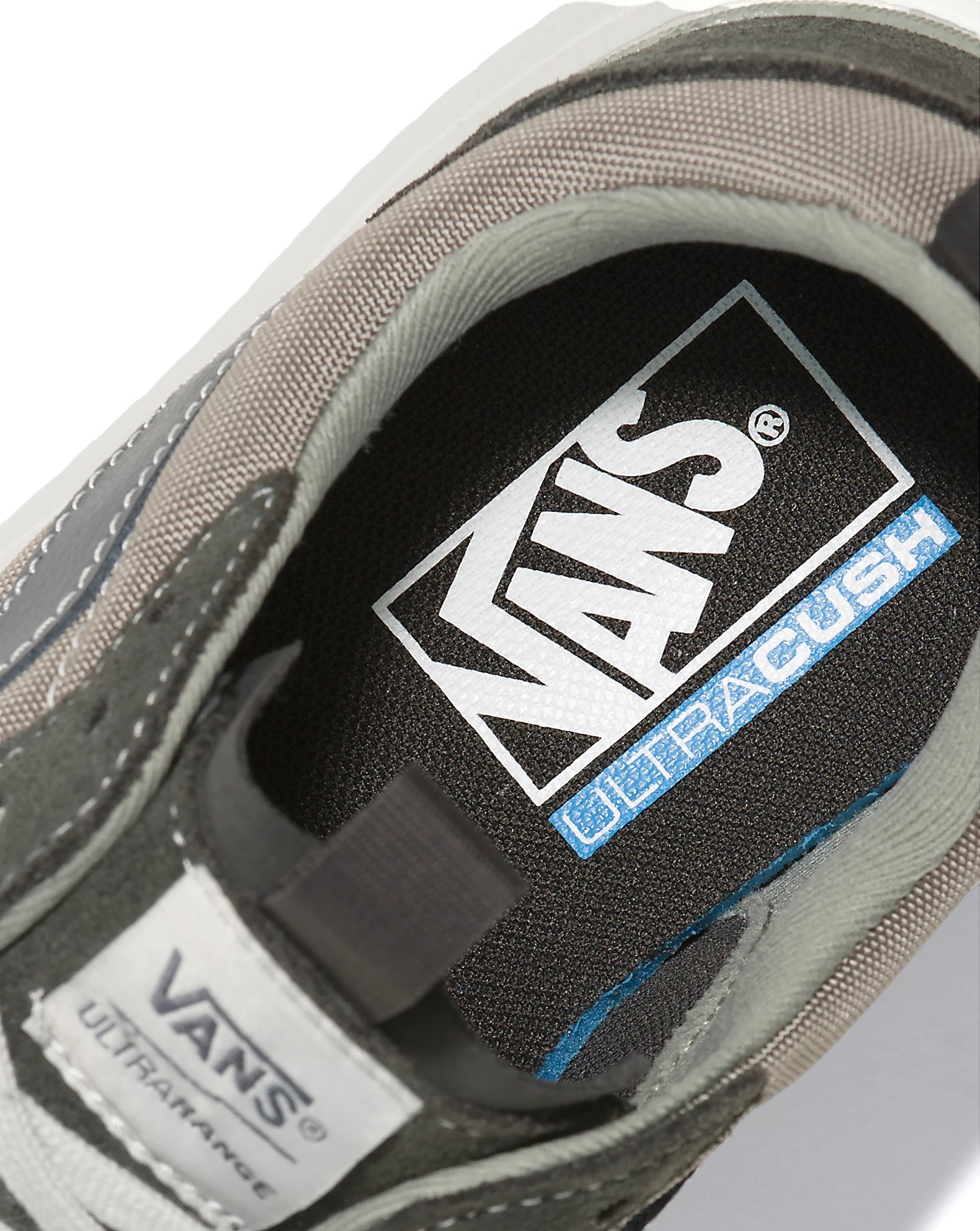 A suede and textile multicolored grey Vans sneaker.