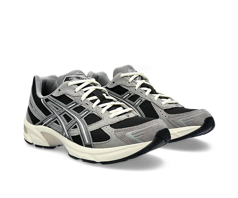 A black and gray running shoe from ASICS.