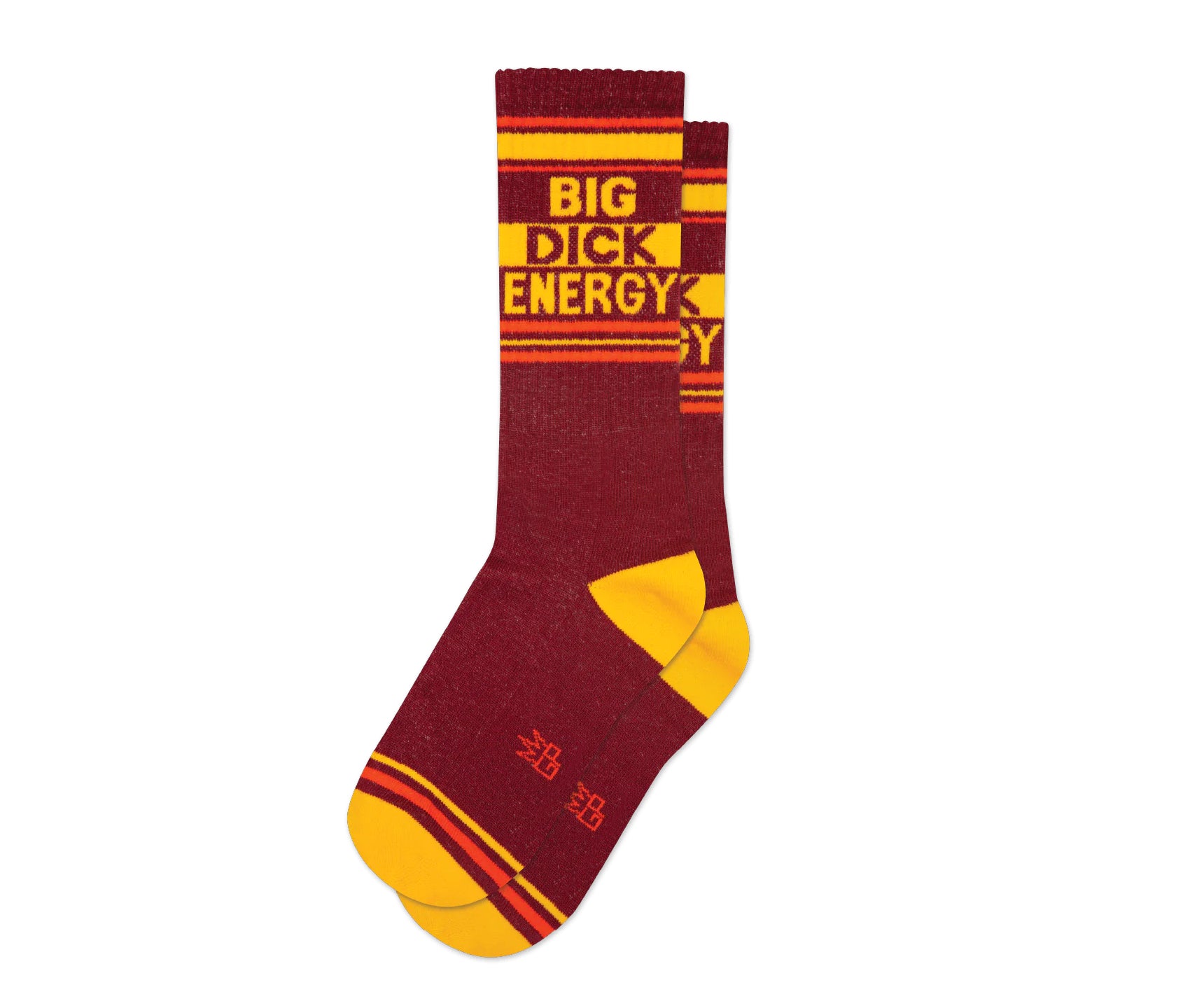 A pair of burgundy and yellow crew socks that read "Big Dick Energy" with the Gumball Poodle logo along the arch.