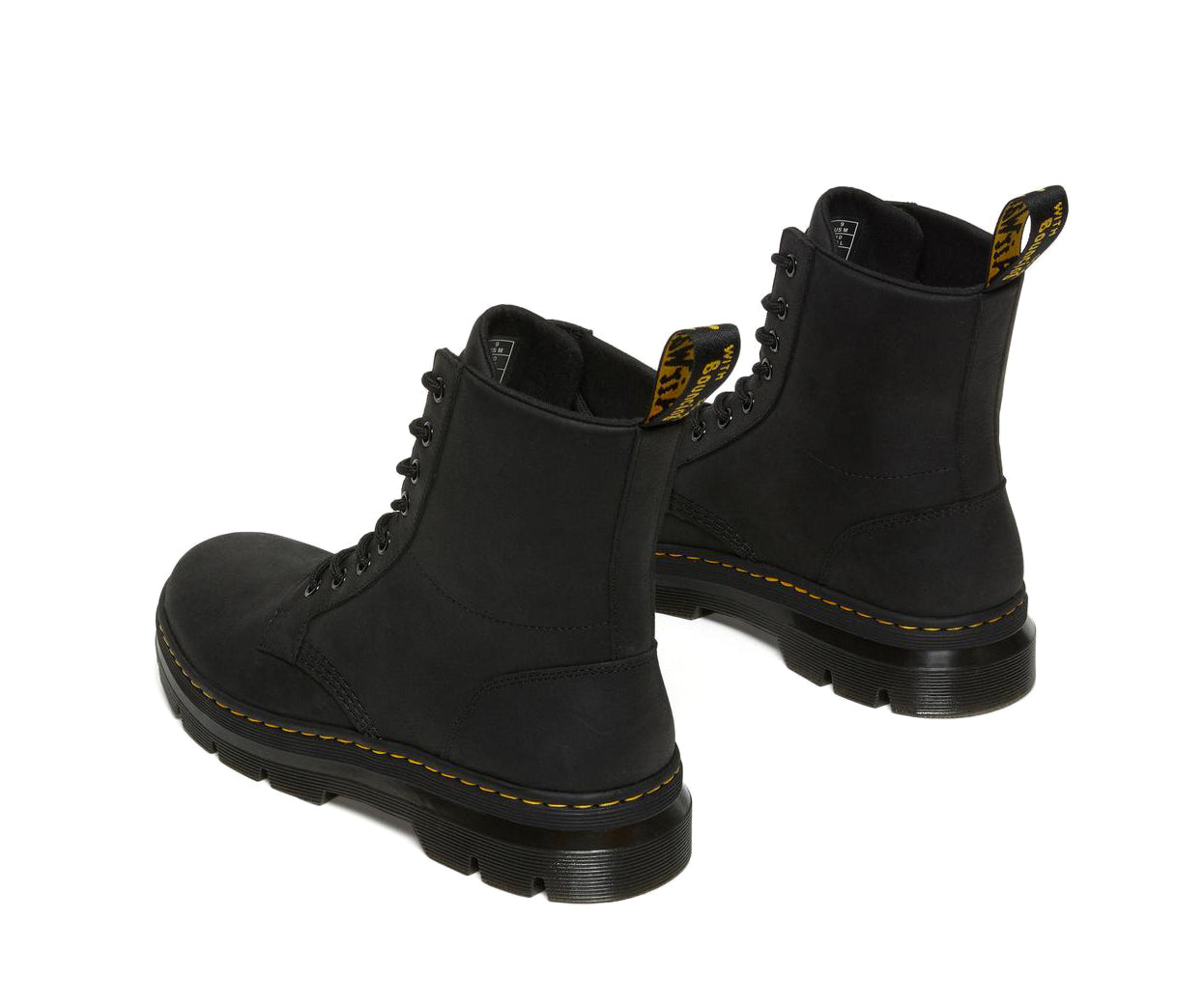 A black, softened leather boot from Dr. Martens.