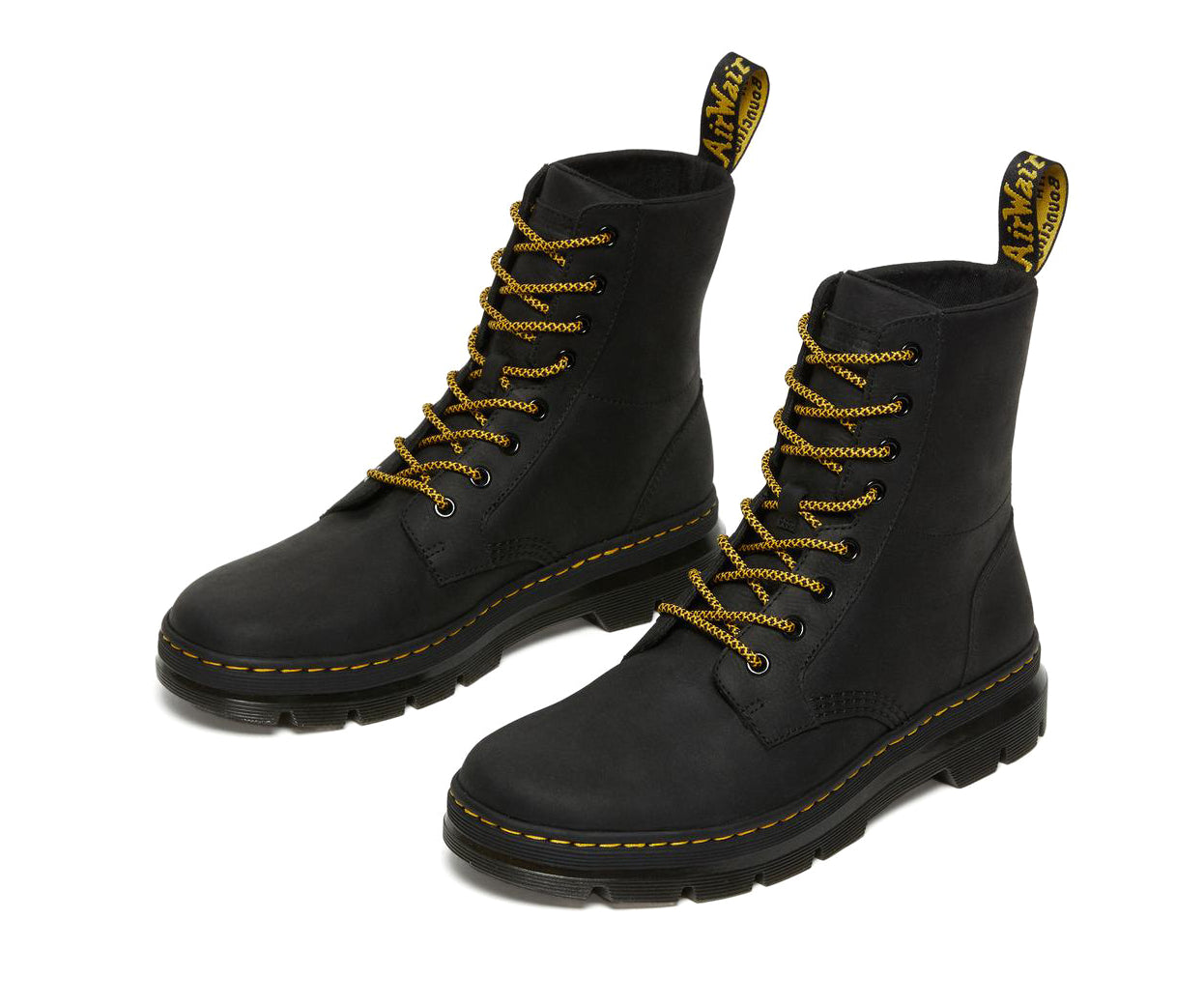 A black, softened leather boot from Dr. Martens.