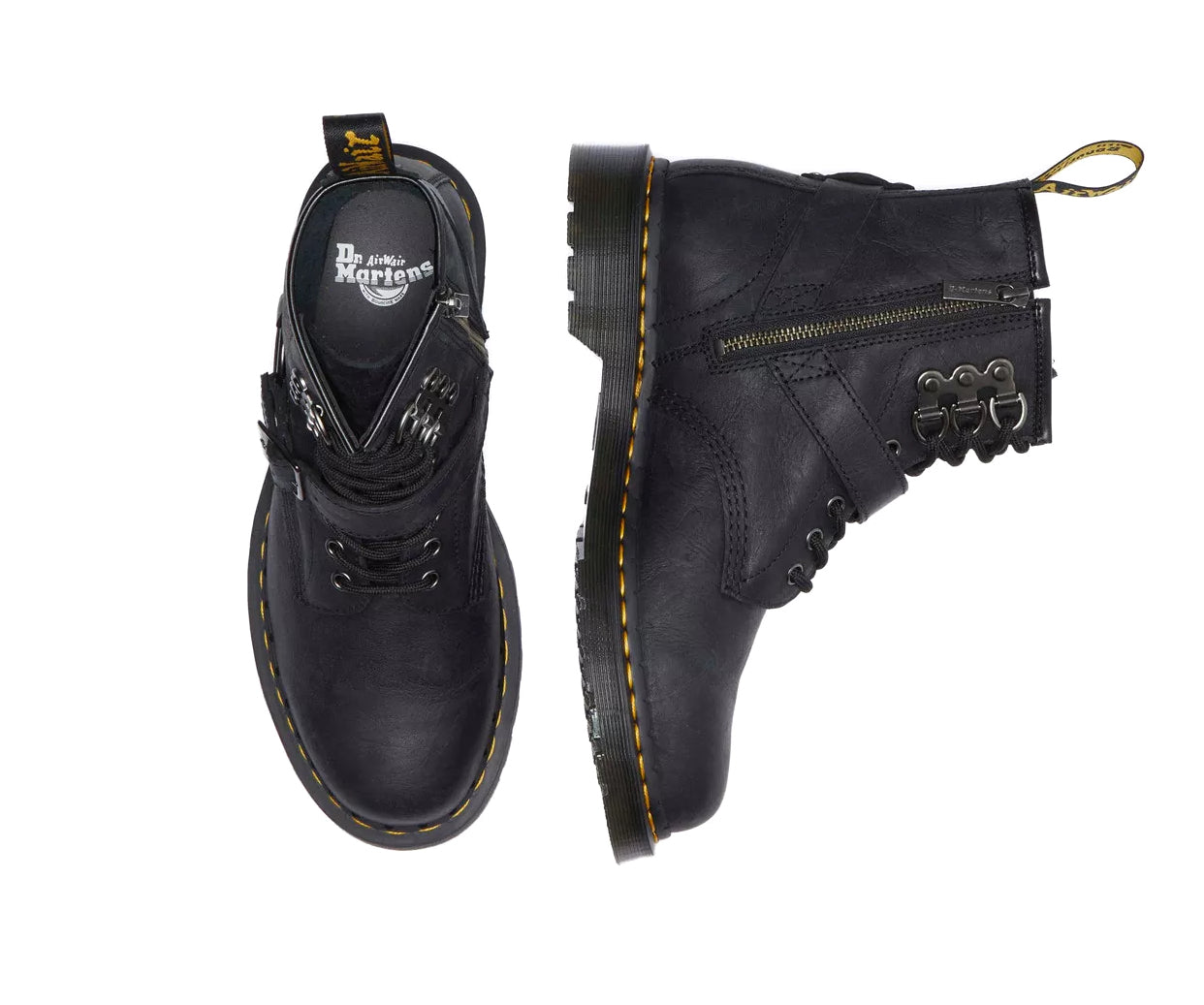 A black leather boot from Dr. Martens with additional straps and buckles.