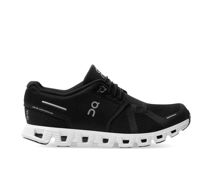 A black sneaker with white accents from On Running.