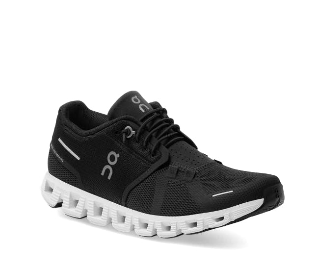 A black sneaker with white accents from On Running.5