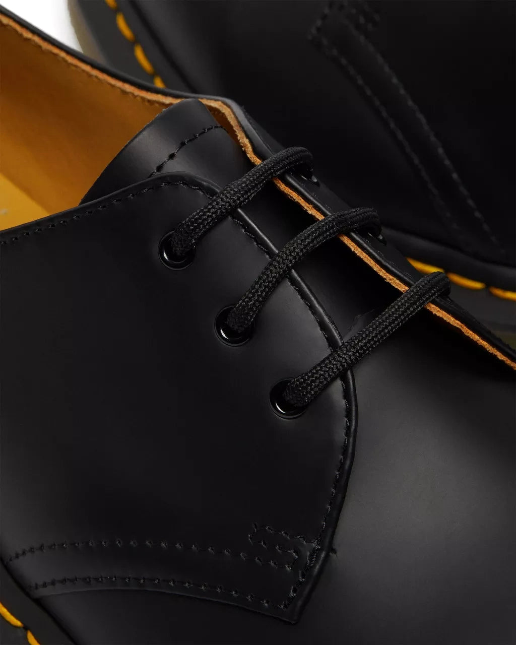 A low cut black leather oxford shoe from Dr. Martens.