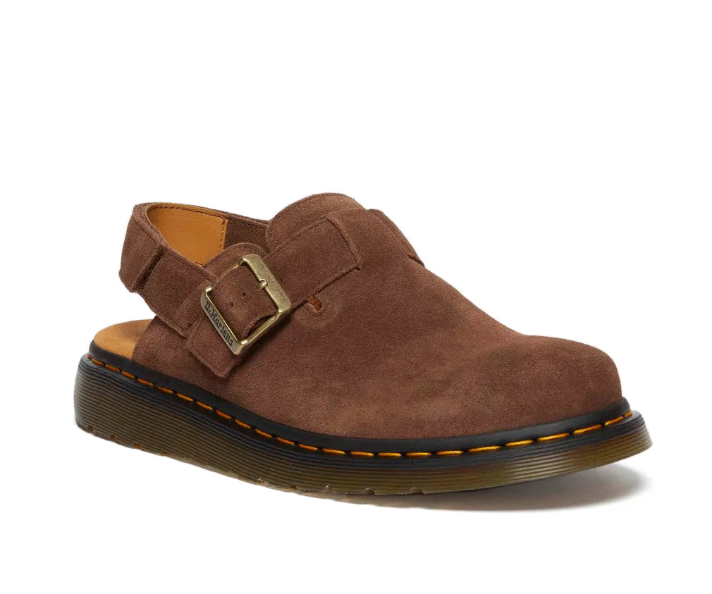 A brown suede mule sandal from Dr. Martens.