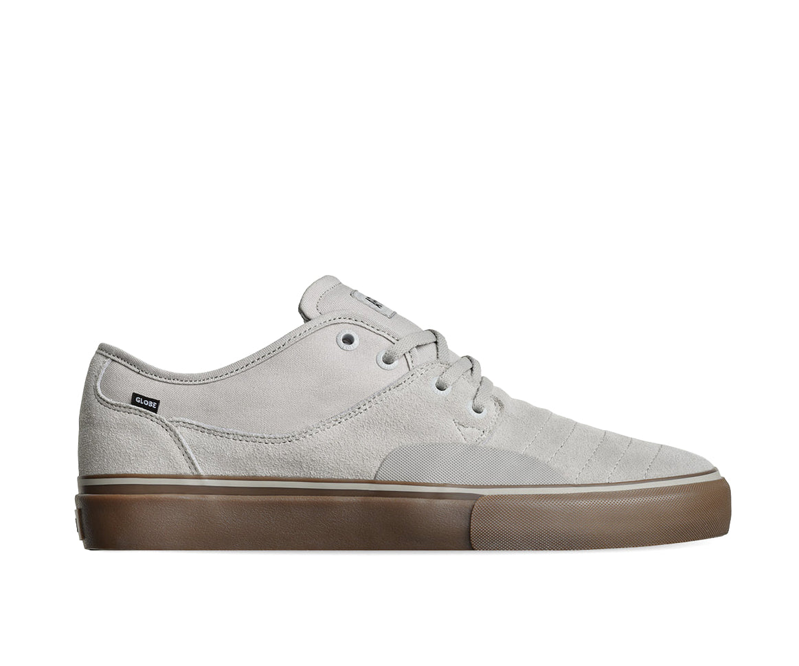 A light gray suede skate shoe with gum brown sole from Globe.