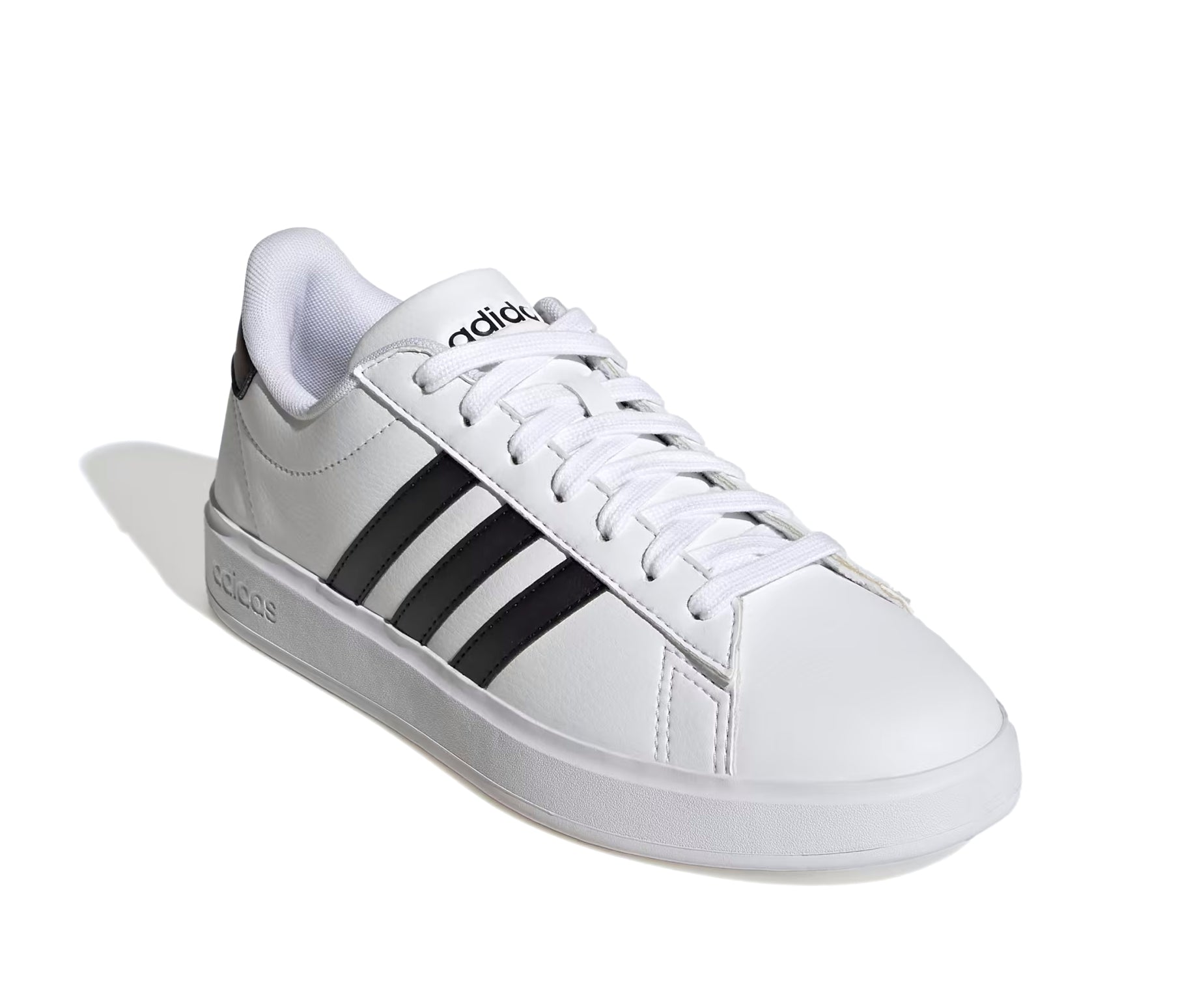 A white leather adidas sneaker with black accents.