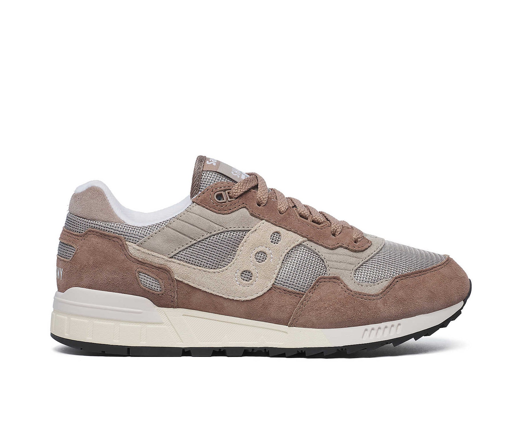 A brown and beige sneaker from Saucony.