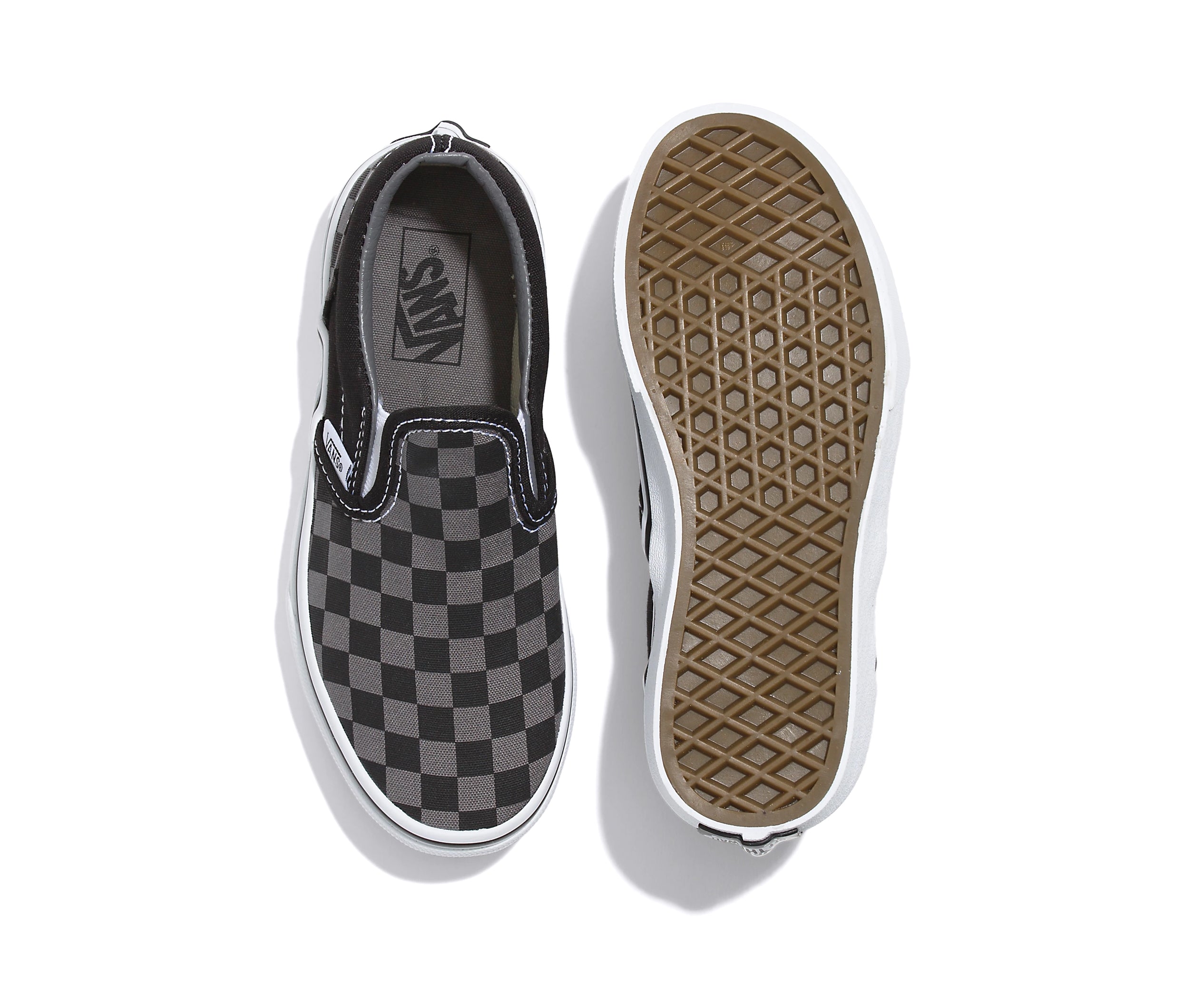 A checkerboard black and pewter canvas kids' slip-on shoe.