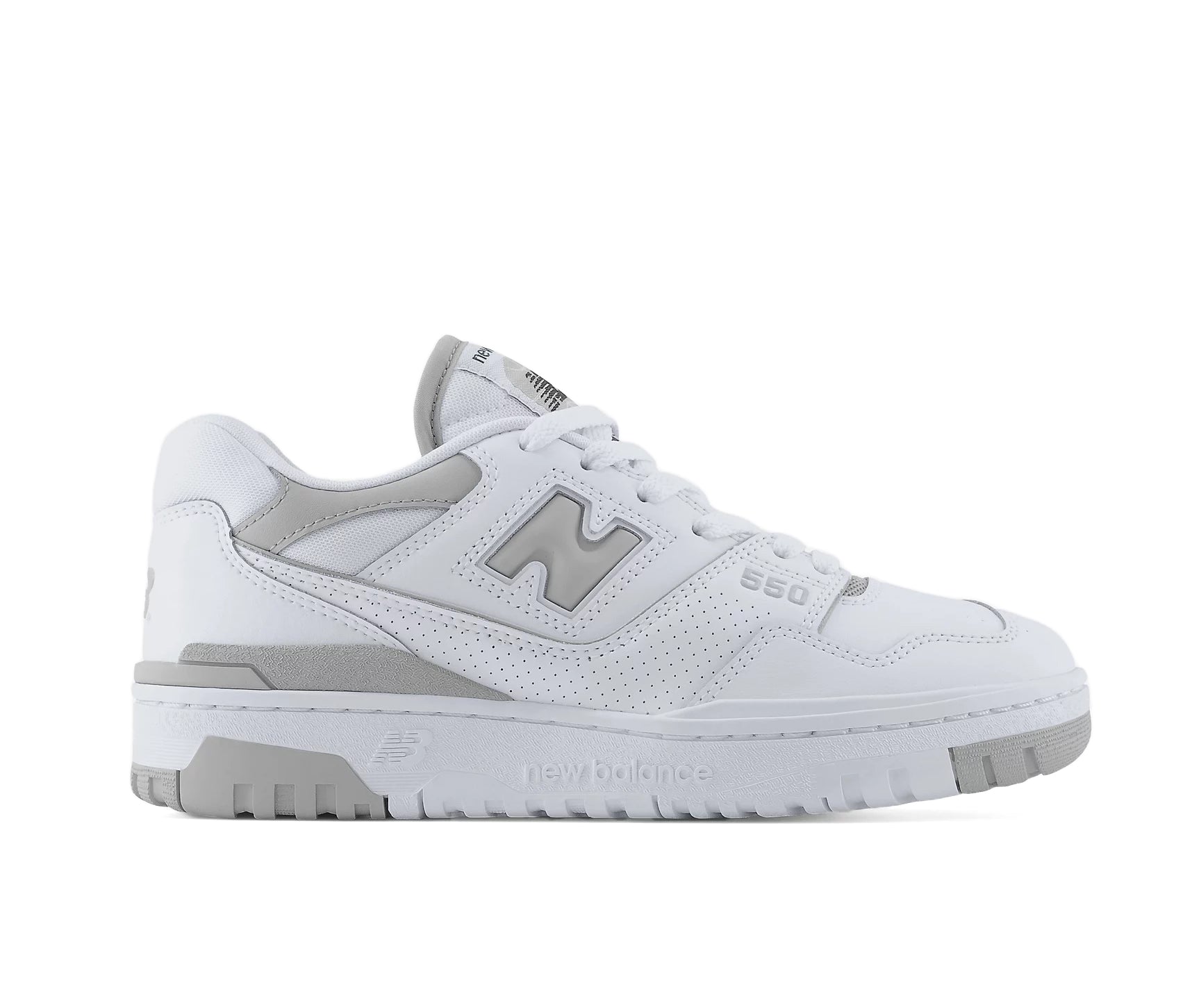 A white leather court shoe from New Balance with gray accents.