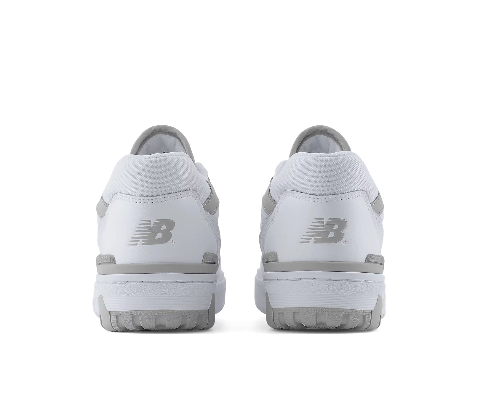 A white leather court shoe from New Balance with gray accents.