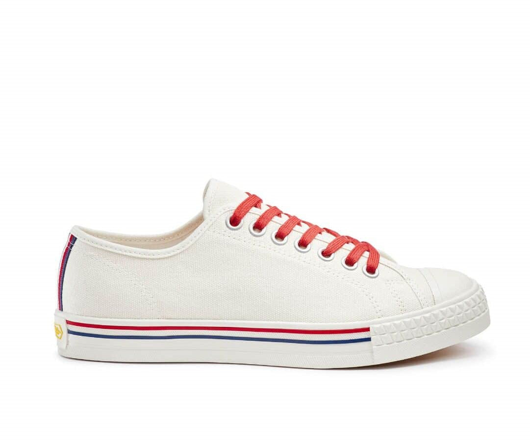 An off-white canvas sneaker with red and blue accents from Hood.