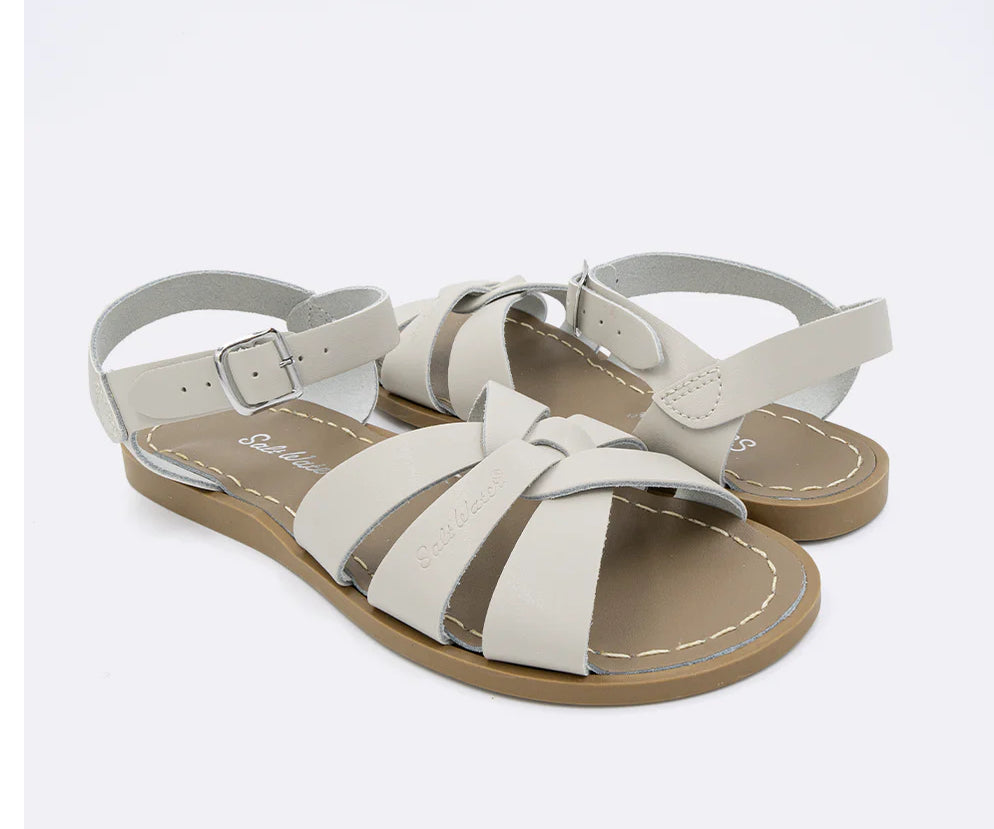 An ivory white leather 3-strap sandal from Salt Water.